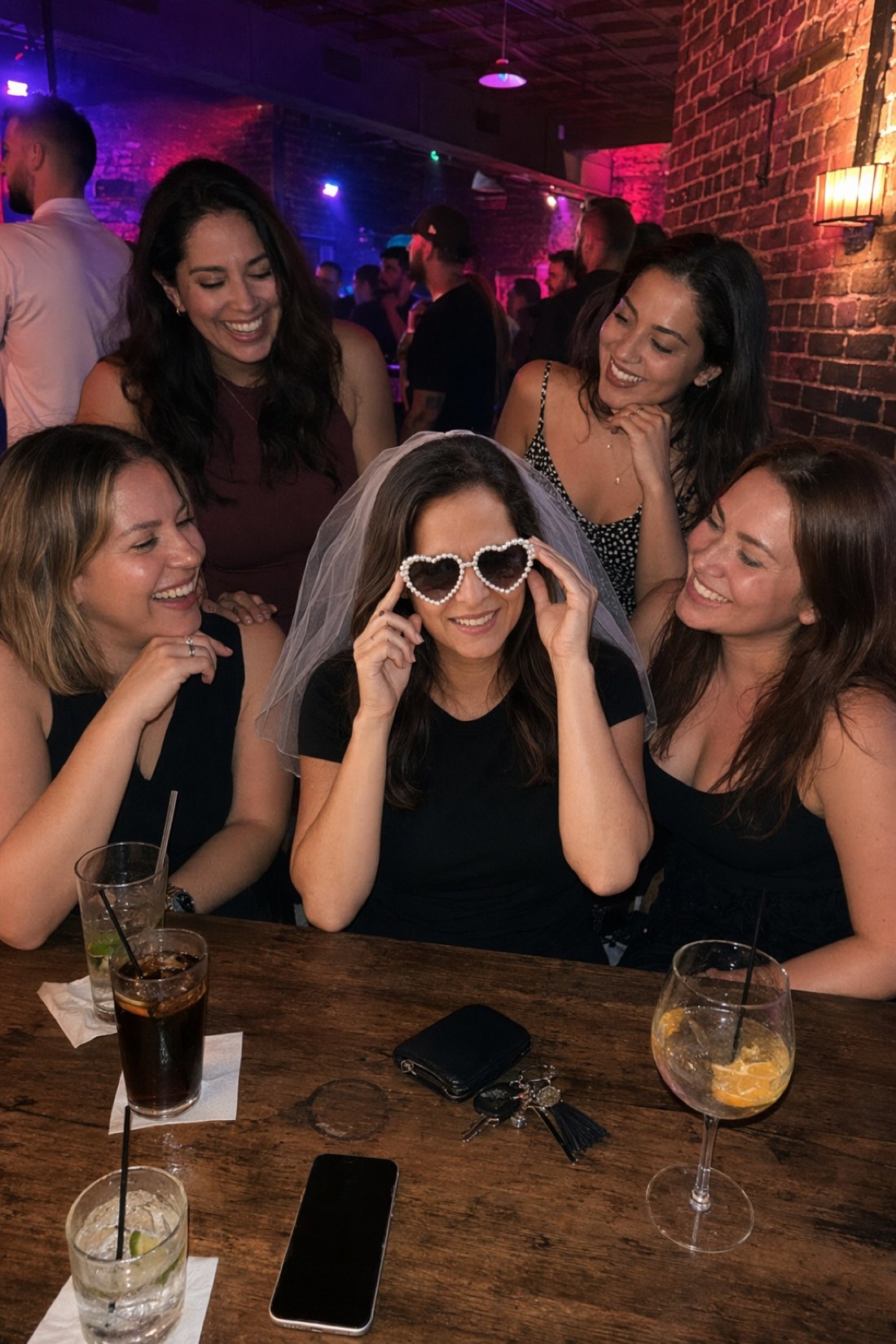 Woman celebrating at a bachelorette party with friends