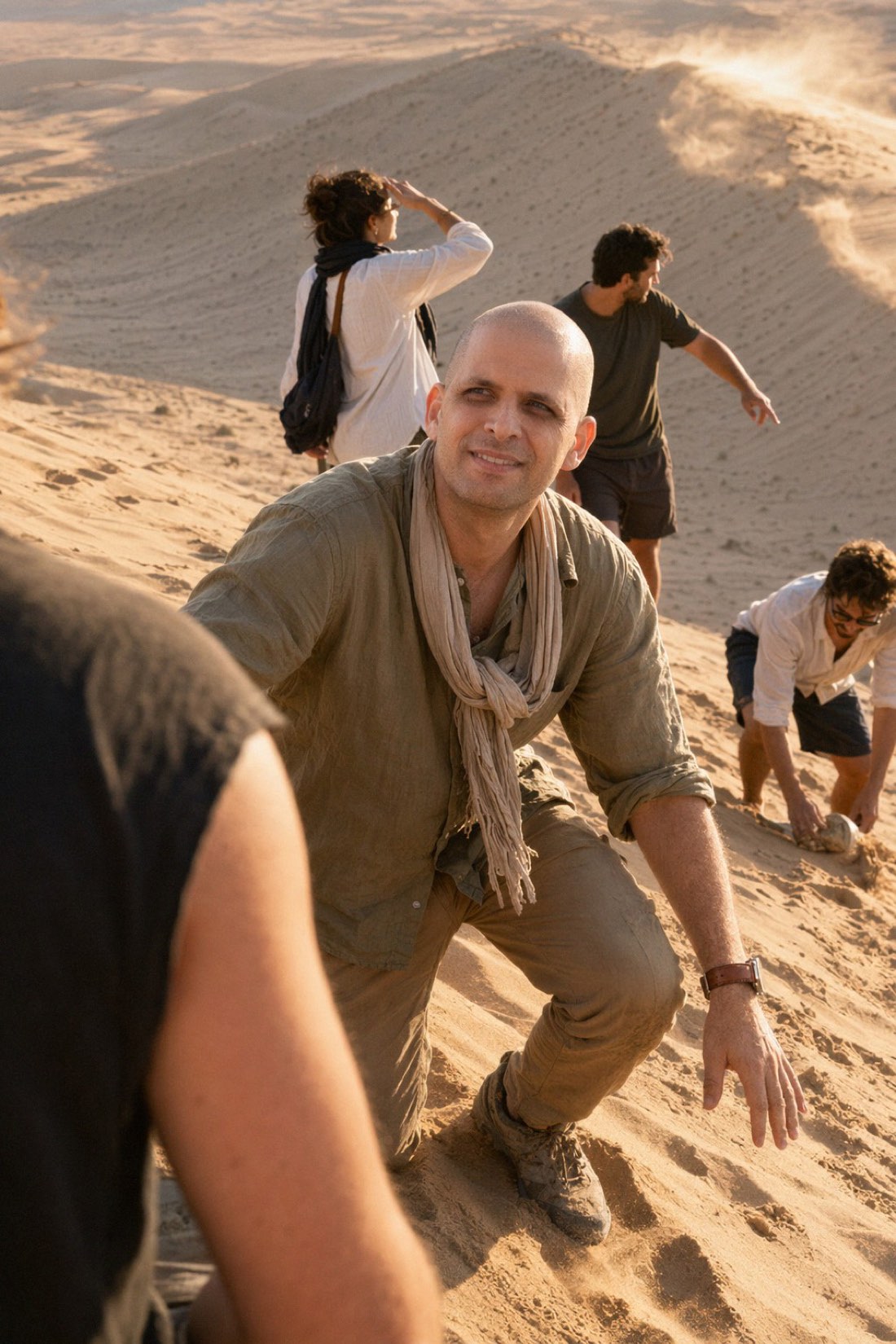 Adventure photo: man on desert sand dunes at golden hour