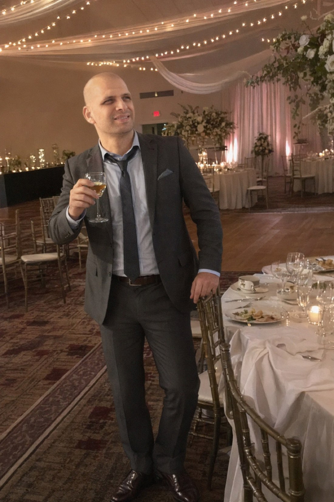 Virtual AI photo shoot result: a man in a suit at a formal evening event