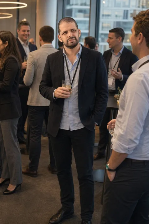 AI LinkedIn photo example: at a networking event, mid-conversation